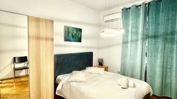 2 habitaciones, tabla de planchar con plancha y wifi gratis
