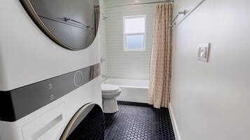 Hair dryer, towels, soap, shampoo