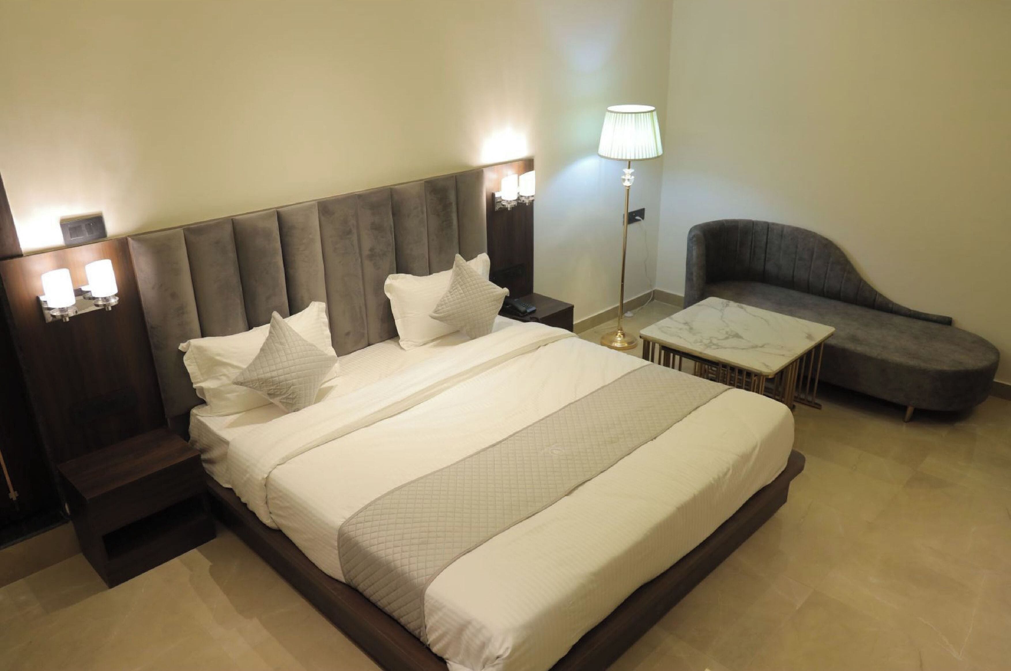 Habitación superior | Escritorio, wifi gratis y ropa de cama 