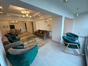 Apartamento Deluxe | Zona de estar