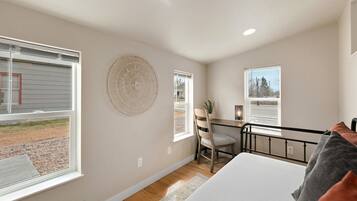 House, Multiple Beds, Patio, Garden View (4004 Main St) | 4 bedrooms, individually decorated, individually furnished, desk