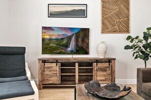 55-inch flat-screen TV with digital channels, TV