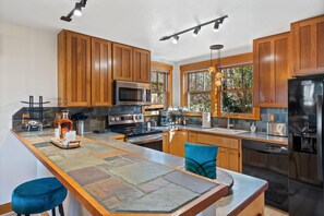 Condo, Multiple Beds, Patio, Garden View (415 Mason Court 5B) | Private kitchen - Sleek Condo - Near Park, Poudre River and Old Town (Fort Collins)