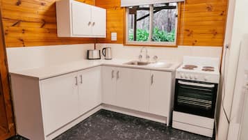 Fridge, microwave, stovetop, cookware/dishes/utensils