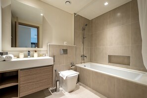 Hair dryer, towels, soap, shampoo