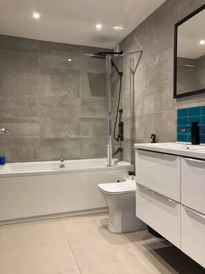 Hair dryer, towels, soap, shampoo