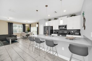 Fridge, microwave, oven, stovetop - Luxury Furnished 5 Bedroom 5 Bathroom Town Home With Pool On Champions Gate (Davenport)