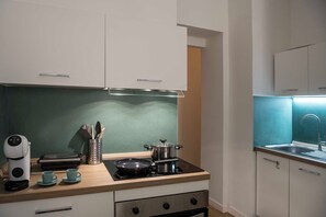 Kylskåp, ugn, spishäll och diskmaskin