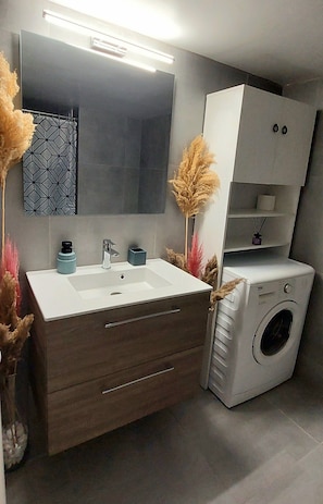 Hair dryer, towels, soap, shampoo