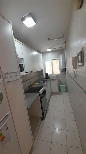 Fridge, microwave, oven, coffee/tea maker