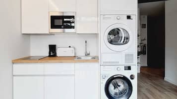 Mini-fridge, microwave, stovetop, coffee/tea maker