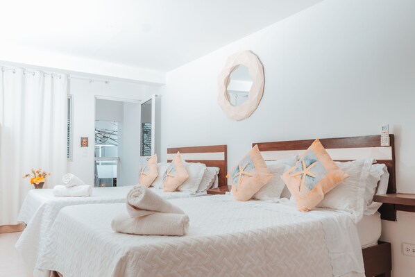 ファミリー 4 人部屋 禁煙 | エジプト綿のシーツ、高級寝具、羽毛の掛け布団、セレクト コンフォート製ベッド