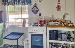 Réfrigérateur, four, plaque de cuisson, cafetière/bouilloire