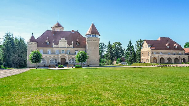 A large, historic building with two prominent towers and a central courtyard. - Stunning apartment in Stolpe/Usedom (Stolpe/Usedom)