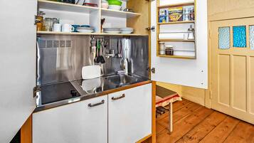 Fridge, stovetop, cookware/dishes/utensils