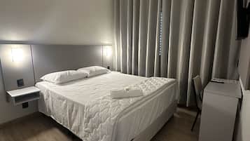 Desk, laptop workspace, free WiFi, bed sheets