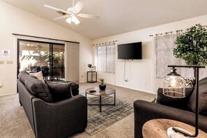 TV - Sunny Oasis 4BR Pool Home with Game Room (Mesa)