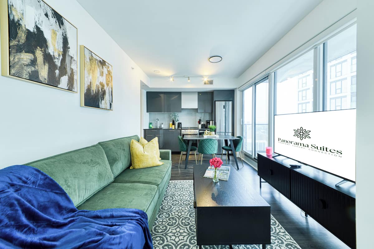 Comfort Suite, 2 Bedrooms, Balcony, Lake View | Living area | 50-inch Smart TV with digital channels, Netflix, Hulu
