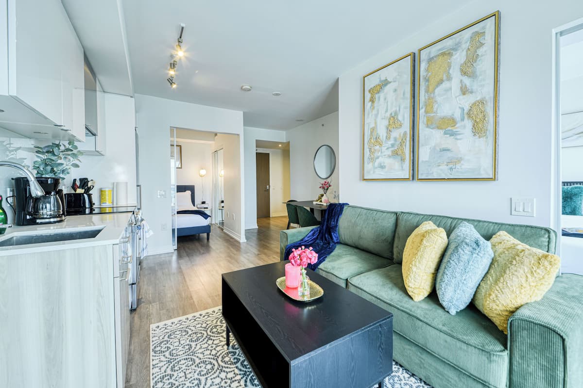 Luxury Suite, 2 Bedrooms, Balcony, Lake View | Living area | 50-inch Smart TV with digital channels, Netflix, Hulu