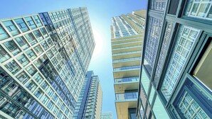 A high-rise building with multiple floors and large windows. - Panorama Suites (Toronto)
