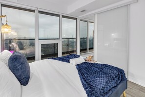 Panoramic Suite, 2 Bedrooms, Balcony, Lake View | 2 bedrooms, individually decorated, individually furnished, desk