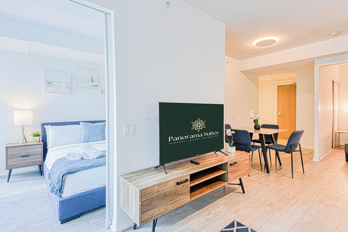 Signature Suite, 2 Bedrooms, Balcony | Living area | 50-inch Smart TV with digital channels, Netflix, Hulu