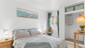 1 dormitorio, tabla de planchar con plancha, wifi gratis y ropa de cama