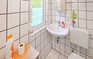 Regadera y secadora de cabello 