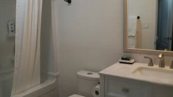 Hair dryer, towels, soap, shampoo