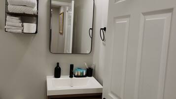 Hair dryer, bidet, towels, soap