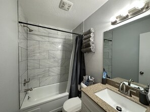 Hair dryer, towels, toilet paper