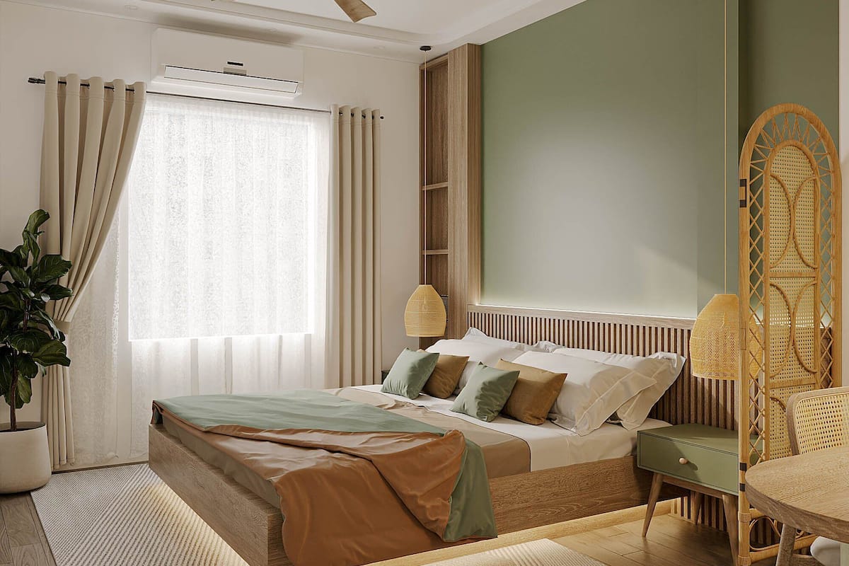 A bedroom with a bed, bedside table, chair, and a potted plant.