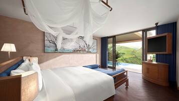 A bedroom with a large bed, a bedside table, a TV, and a window with a view of the outdoors.