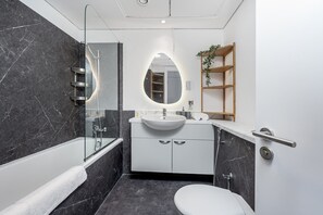 Hair dryer, towels, soap, shampoo