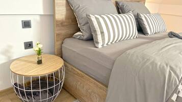 4 dormitorios, caja fuerte, tabla de planchar con plancha