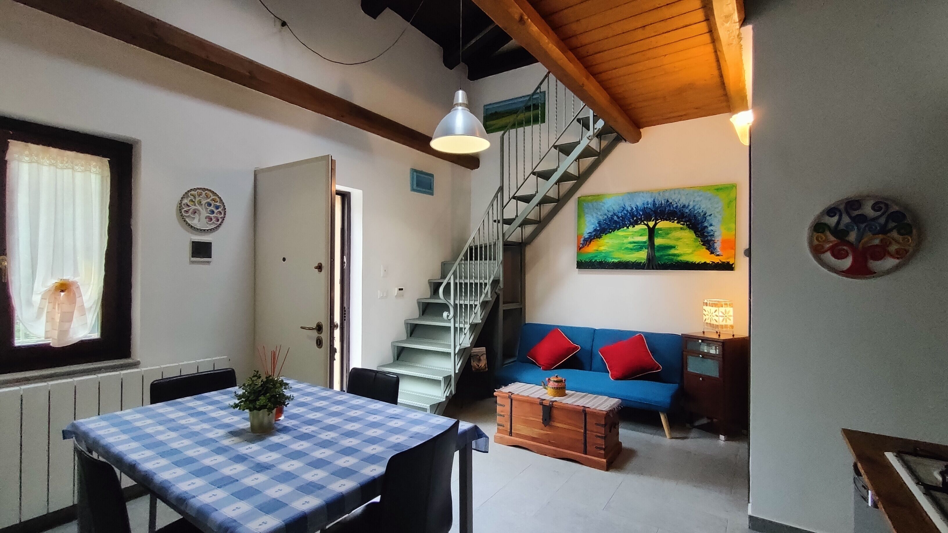 Departamento Confort | Área de sala de estar | Televisión de pantalla plana 