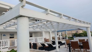 Outdoor dining - New condo with sea view (unit 1) (Wheeland Settlement)