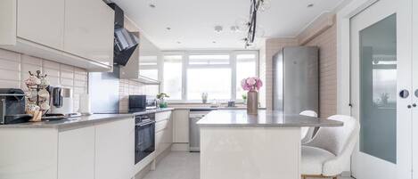 Apartment | Private kitchen | Dining tables