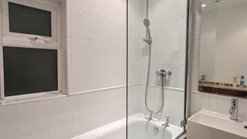 Shower, jetted tub, hair dryer, towels