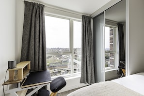 Eenvoudig appartement | 2 slaapkamers, een laptopwerkplek, beddengoed