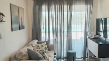 Apartment, 2 Bedrooms, Balcony, Garden View | Living room