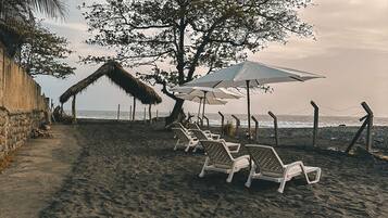 Beach nearby, sun loungers