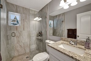 Shower, eco-friendly toiletries, hair dryer, towels