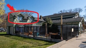 A two-story house with a fenced patio area. - Freshwater Flat, Downtown Douglas - Apart in Downtown right off Center Street. (Douglas)