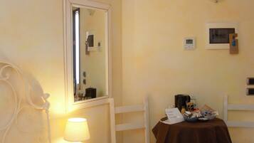 Economy Room | 1 bedroom, premium bedding, in-room safe, blackout drapes