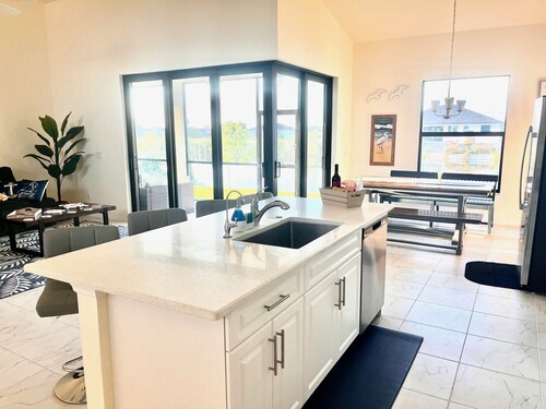 New House with Step Free Entry, Canal, Fish, Sunset Views, Near Golf & Baseball.