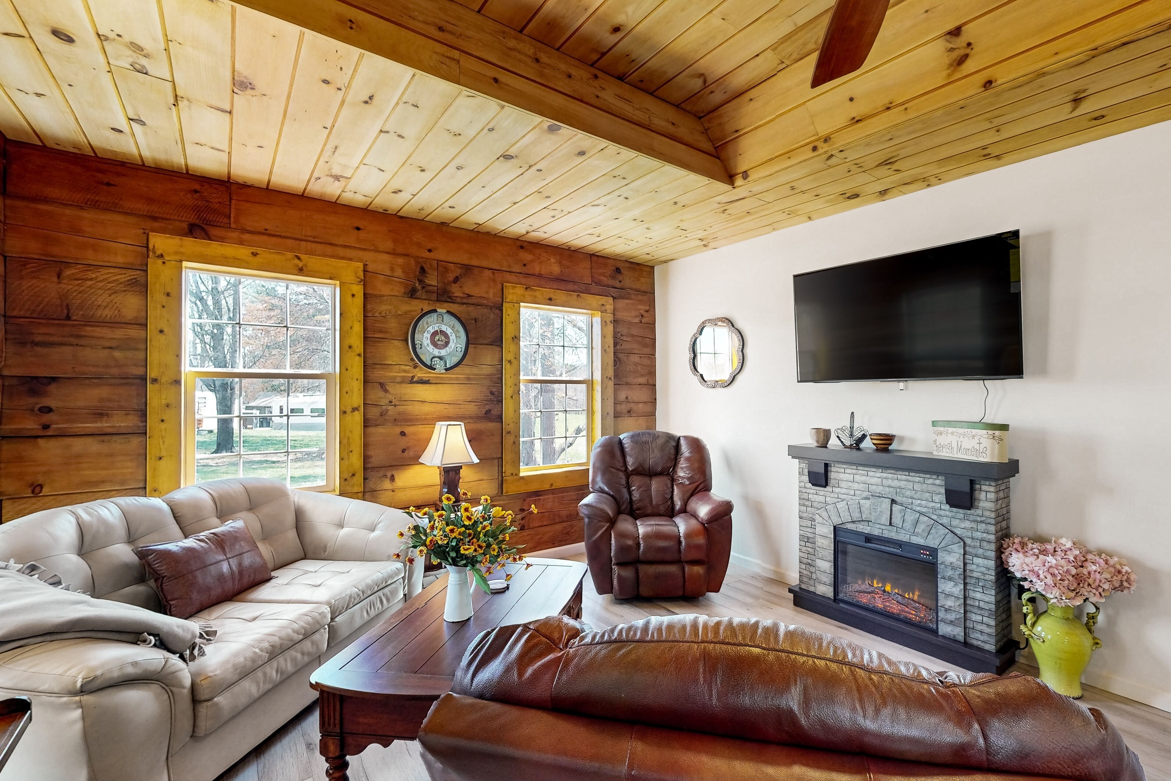 Updated and peaceful home with open layout, fireplace, streaming, deck, AC