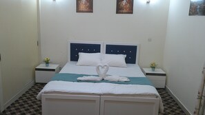 1 غرفة نوم ومكواة/لوح كي وواي فاي وملاءات أسرّة