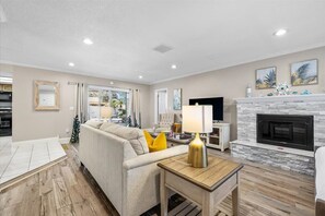 TV, fireplace, offices - Sunny Gulf Coast Escape: Heated Pool & Palm Trees (Largo)