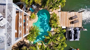 Property grounds - My Grand Floridian: Canal Front, Dock, Pool, Games by Anna Maria Life Vacation Rentals (Holmes Beach)